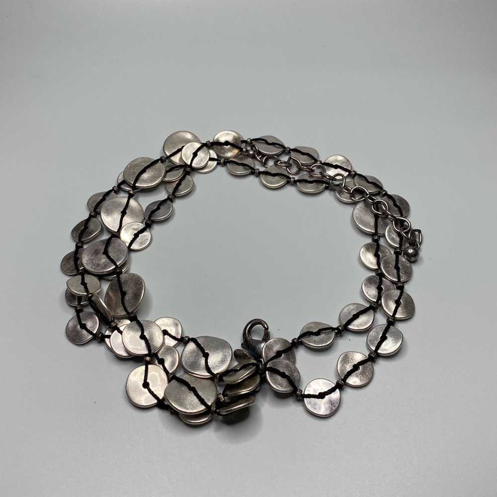 Chicos circle necklace.